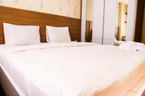 Cozy and Elegant 1BR Apartment Belmont Residence Puri By Travelio